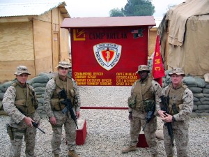 (L-R) LtCol. Norm Cooling, SgtMaj. William Stables, Capt. Eric Kelly, 1stSgt. David Cadd. Camp Krulak, Afghanistan. January 2005.